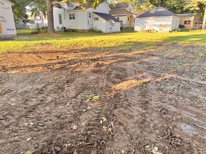 Backyard leveled and graded after cleanup